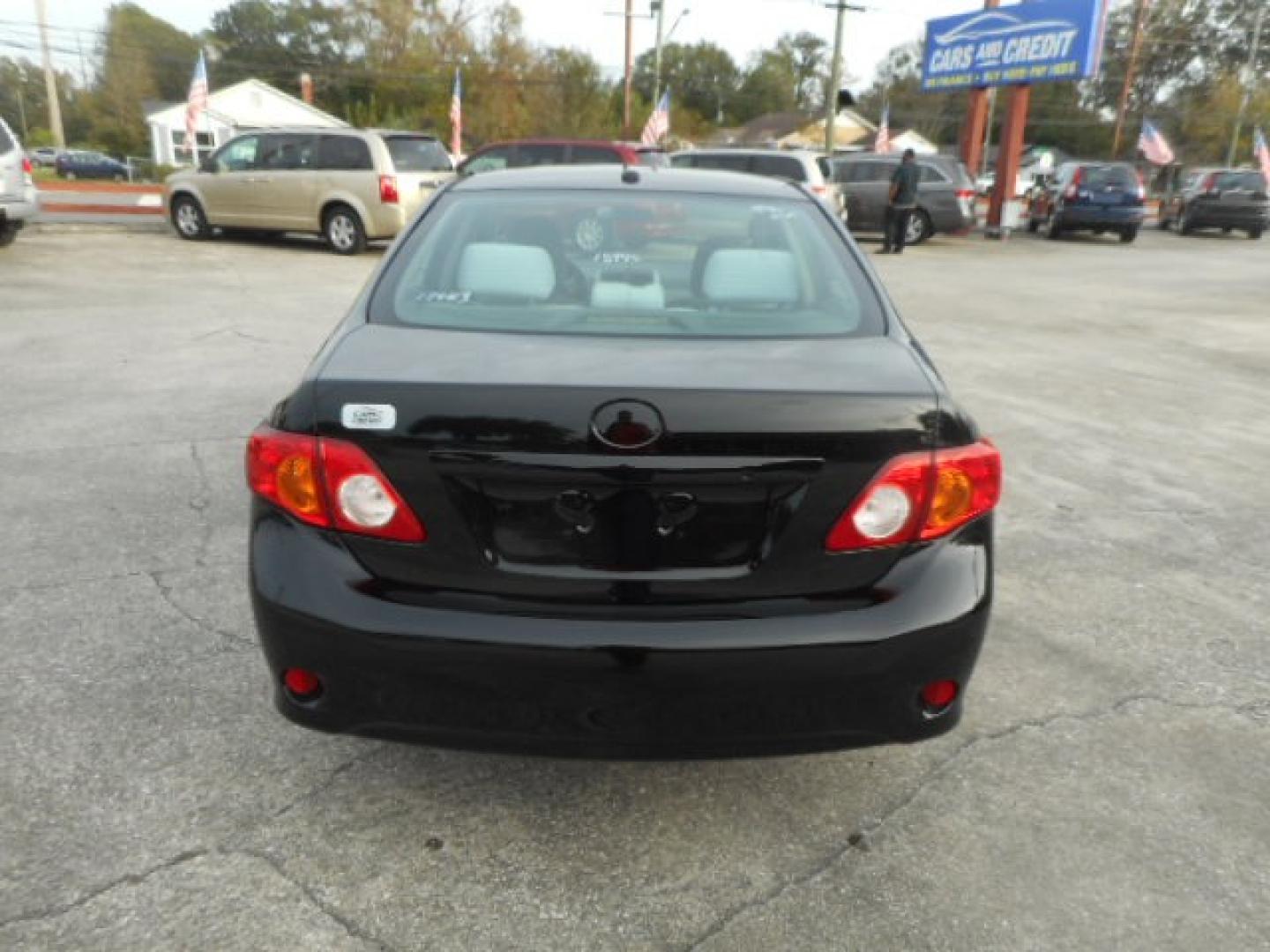 2010 BLACK TOYOTA COROLLA BASE; S; LE; (1NXBU4EE3AZ) , located at 1200 Cassat Avenue, Jacksonville, FL, 32205, (904) 695-1885, 30.302404, -81.731033 - Photo#5